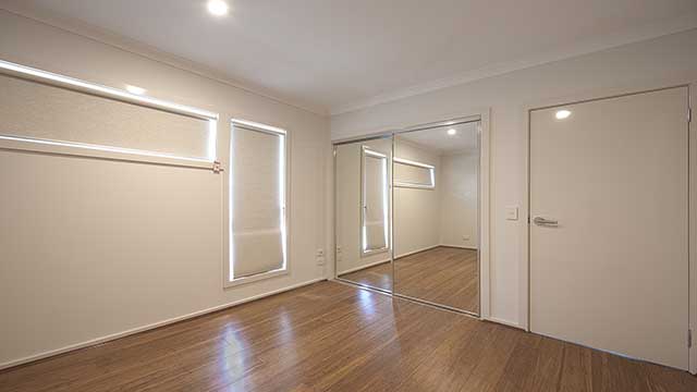 moTIONglo™ - Mirror Sliding Wardrobe Doors - Bedroom - Armstrong Creek - Supplied & Installed by - geelongsplashbacks.com.au